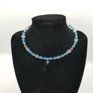 blue and clear beaded choker with sterling silver cross charm